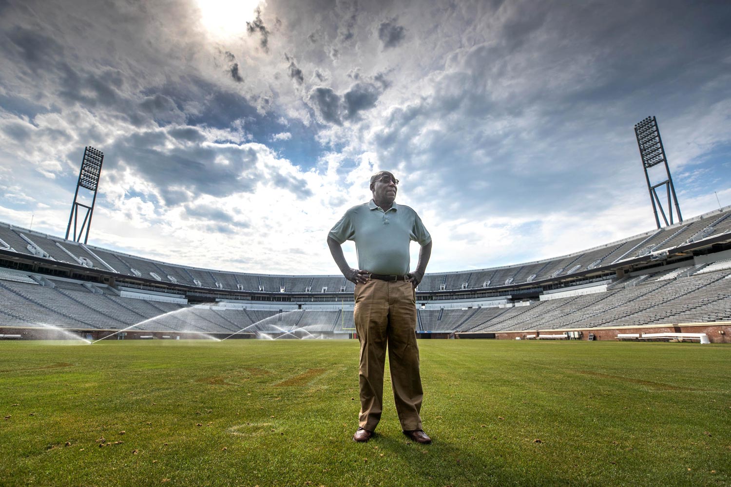 Kent Merritt stands on the UVA football field