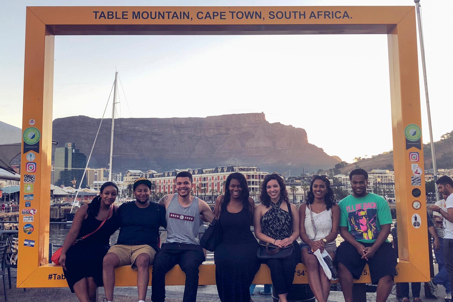 From left, Jianne McDonald, Jah Akande, Elijah McDonnaugh, Kelsey Watkins, Rebecca Robinson, Marwa Abdelaziz and Steven Morris in Cape Town, South Africa pose for a photo