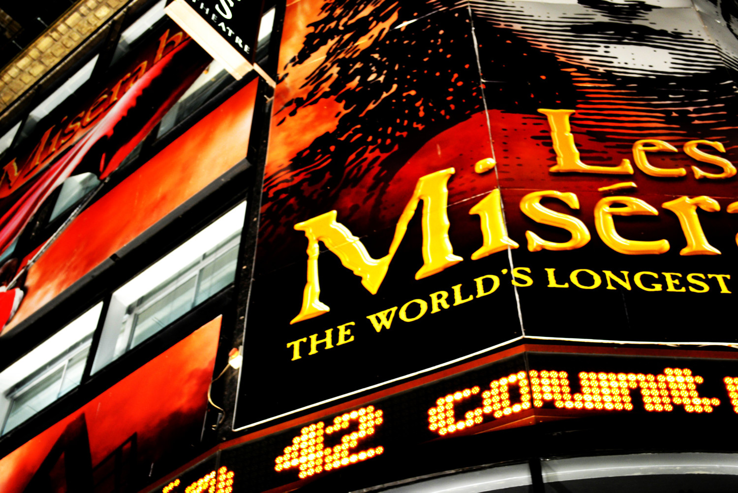 Les Misérables poster on a movie theatre billboard