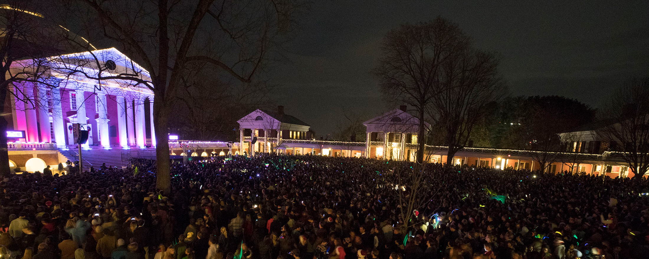 Crowd on the lawn with lights for the Lighting of the Lawn event