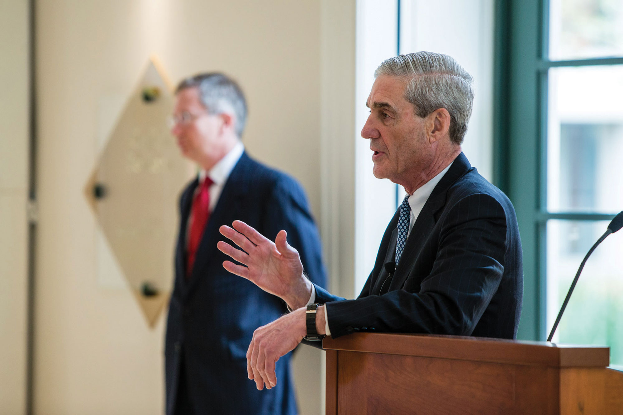 Robert Mueller speaking to an audience at a podium