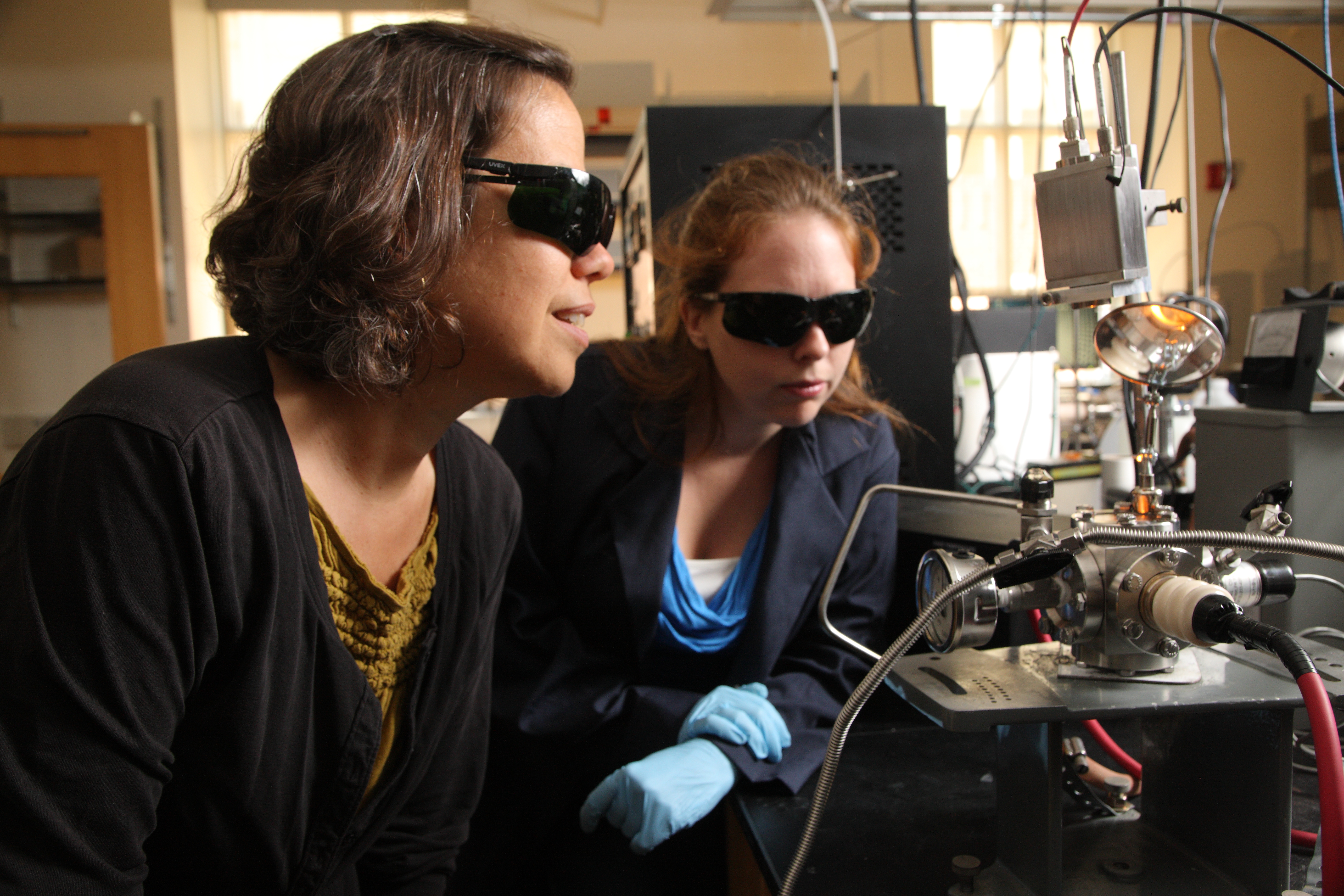Elizabeth Opila, left, and Kathleen Shugart, right, work in a lab