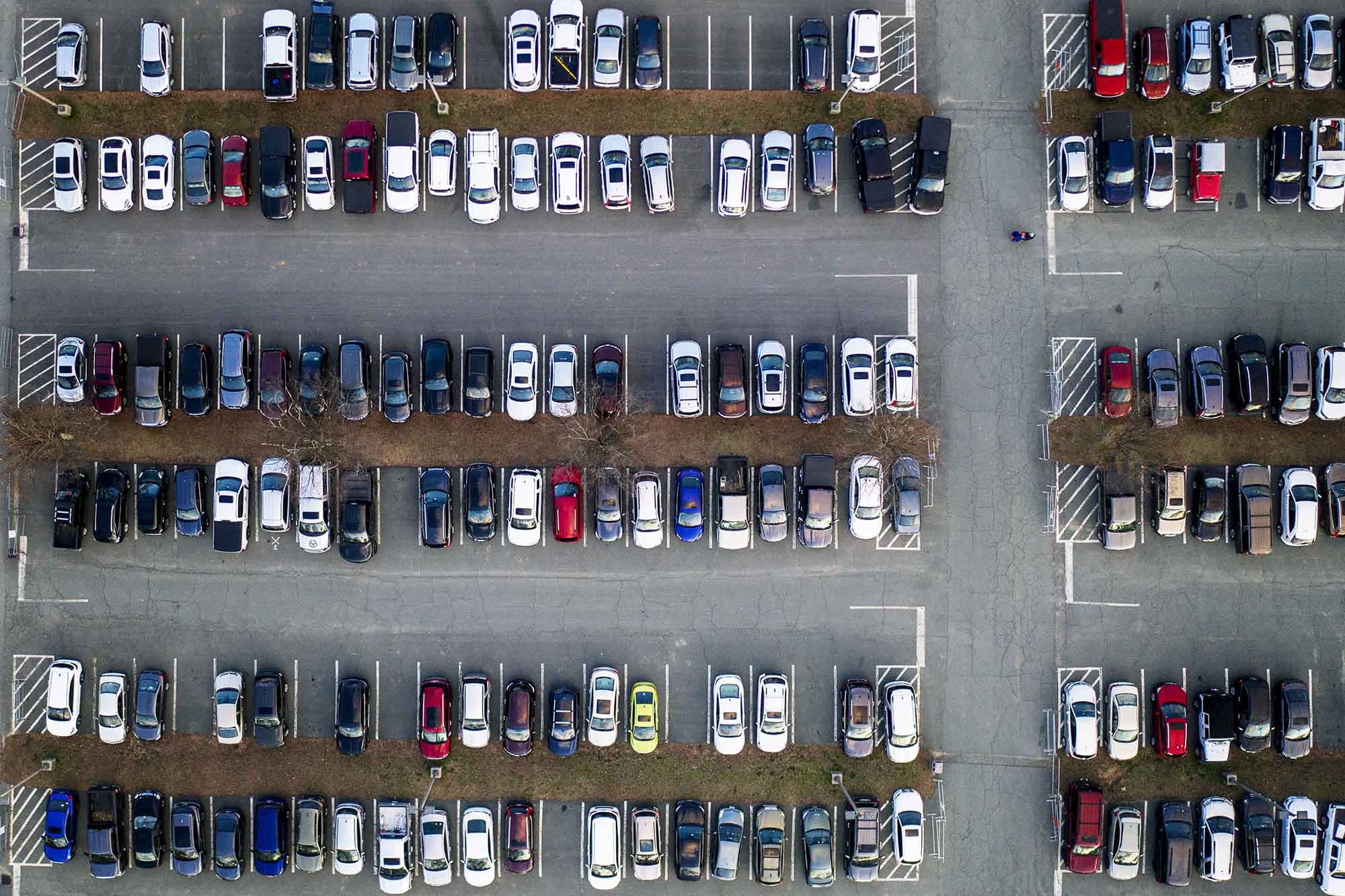 Arial view of a parking lot with cars parked