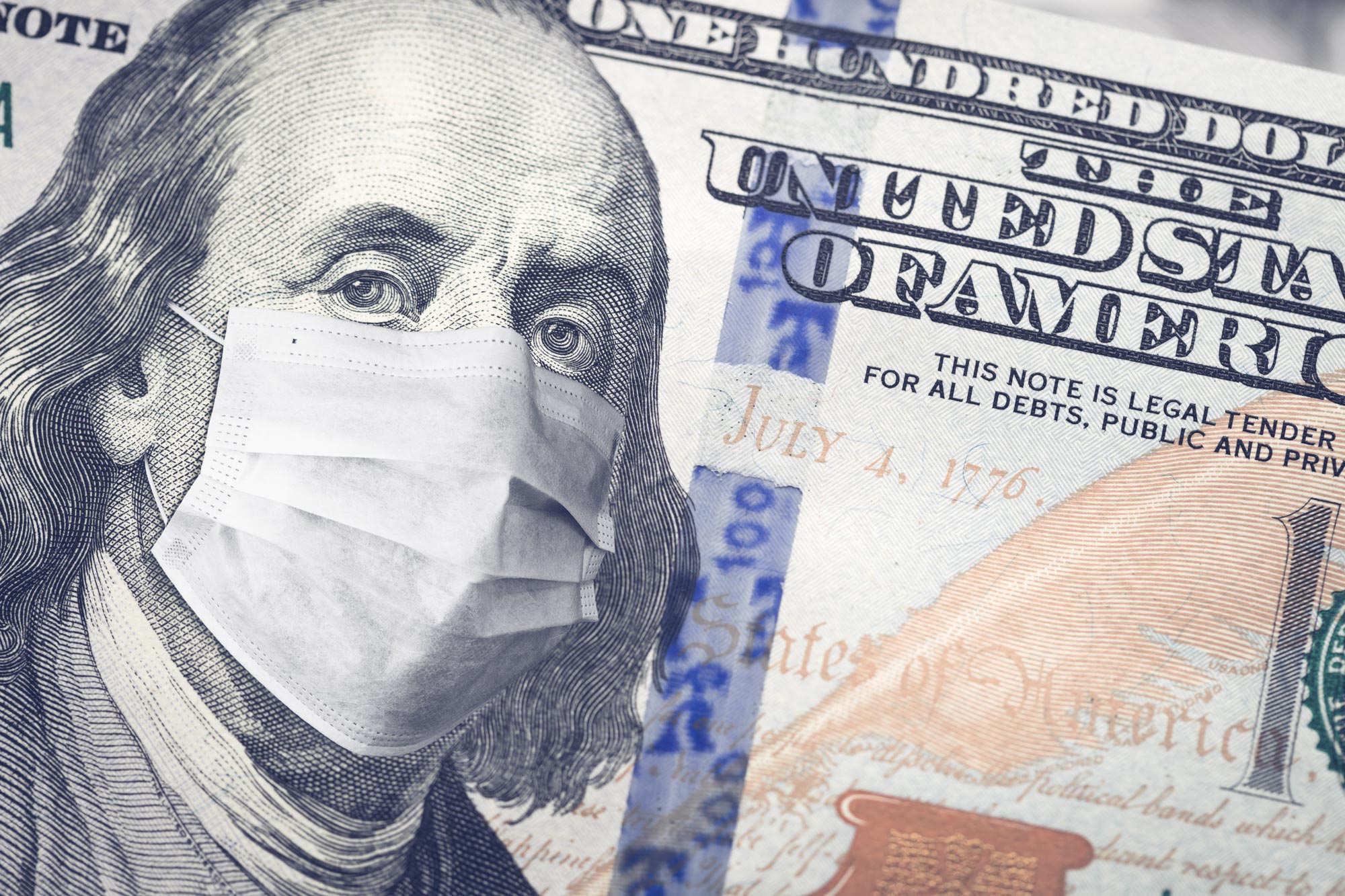 Benjamin Franklin on the 100 dollar bill wearing a mask