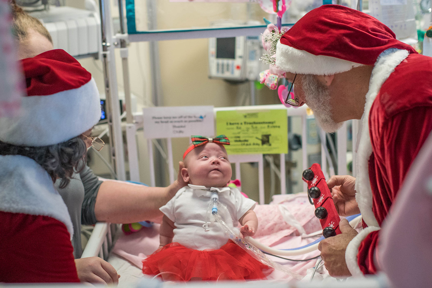 Santa Claus, visiting a baby in the NICU