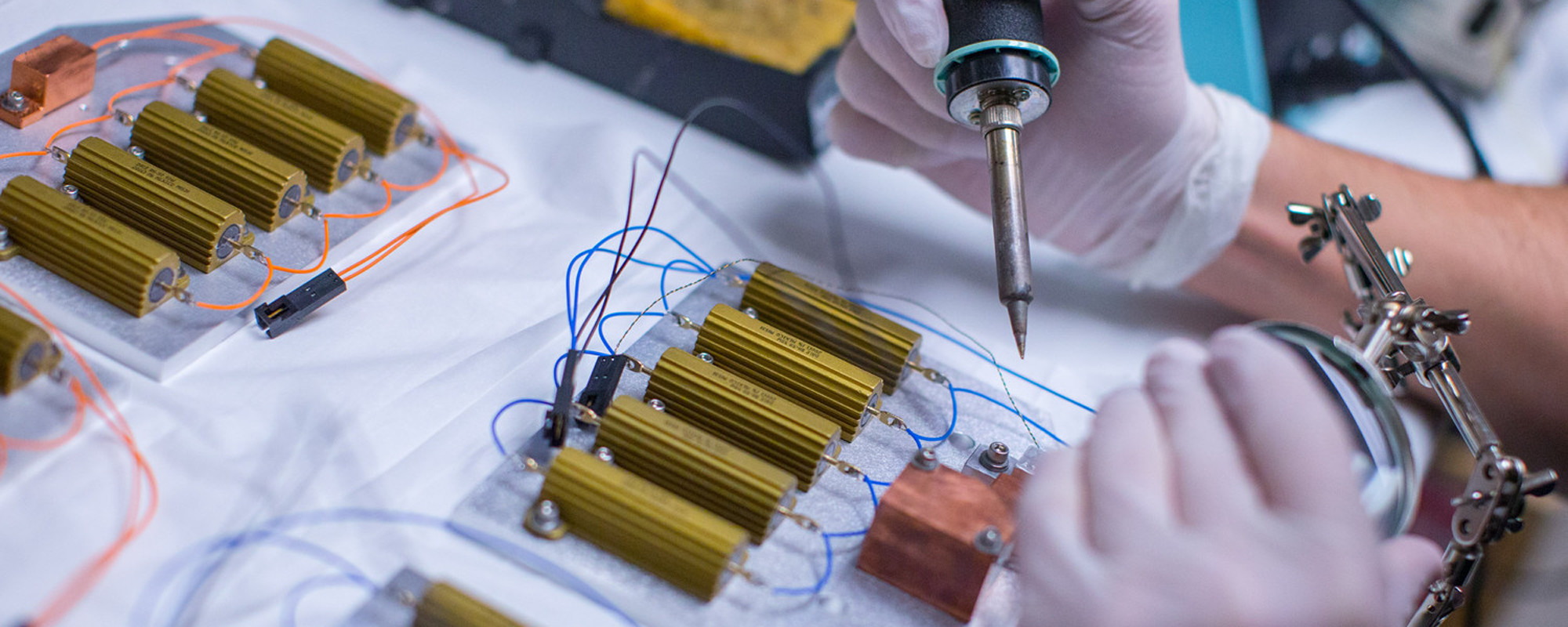 Person soldering a circuit board