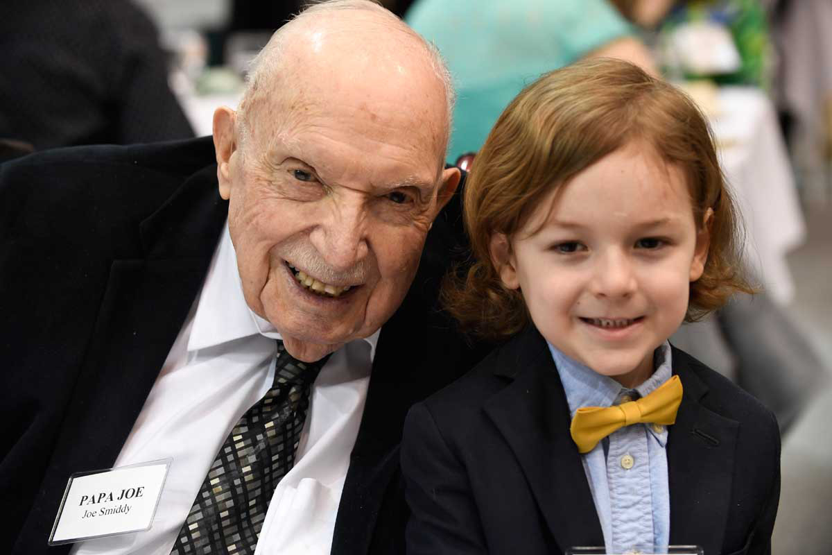 Joseph C. “Papa Joe” Smiddy, left, and his grandson William, right, smile for the camera