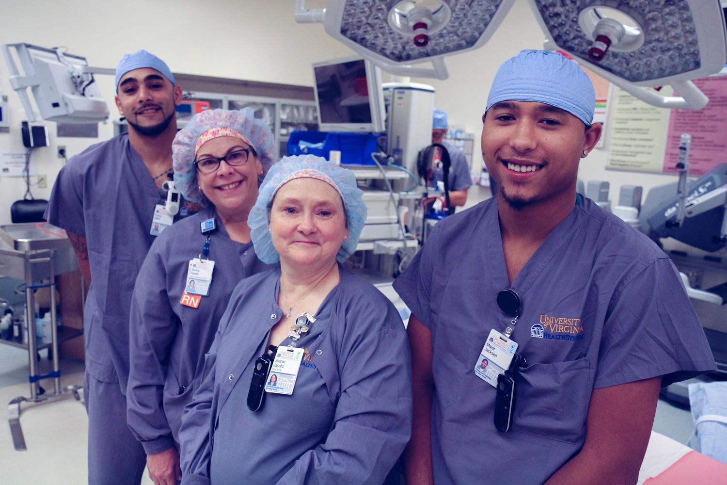 Surgery team: Irving Miller, Donna Fewell, Sharon Jacobs and Major Jackson stand together and smiles at the camera