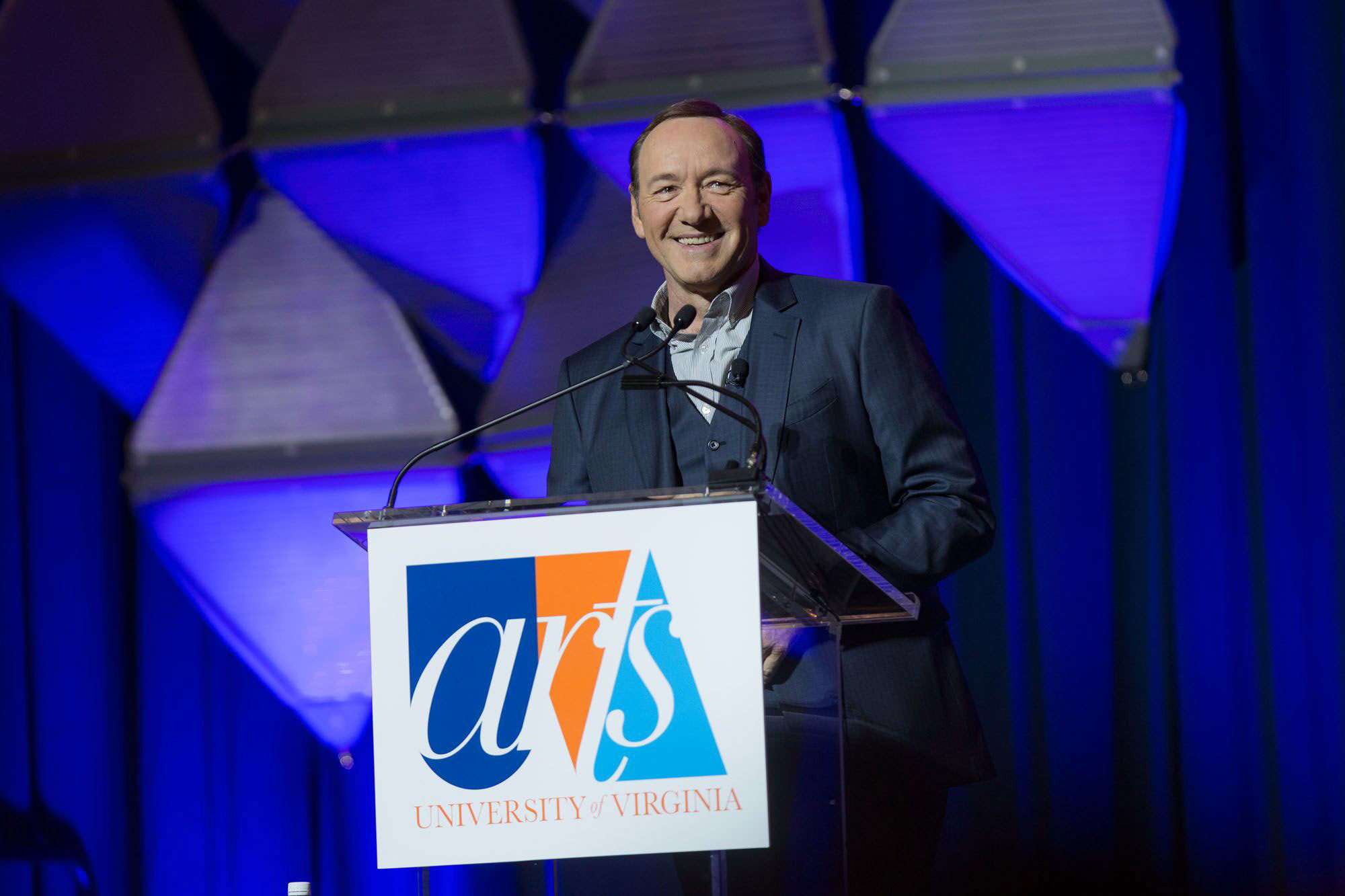 Kevin Spacey speaking at a podium
