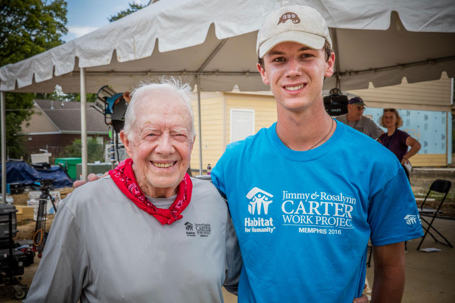 Taylor Thompson poses with  former President Jimmy Carter for a picture