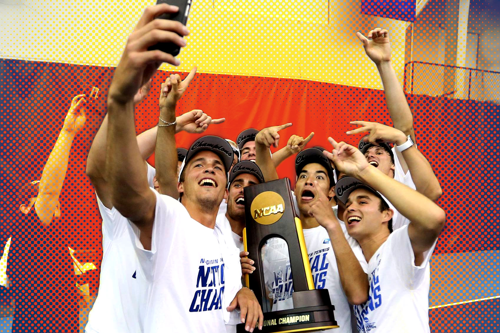 Mens tennis team take a selfie with their NCAA trophy