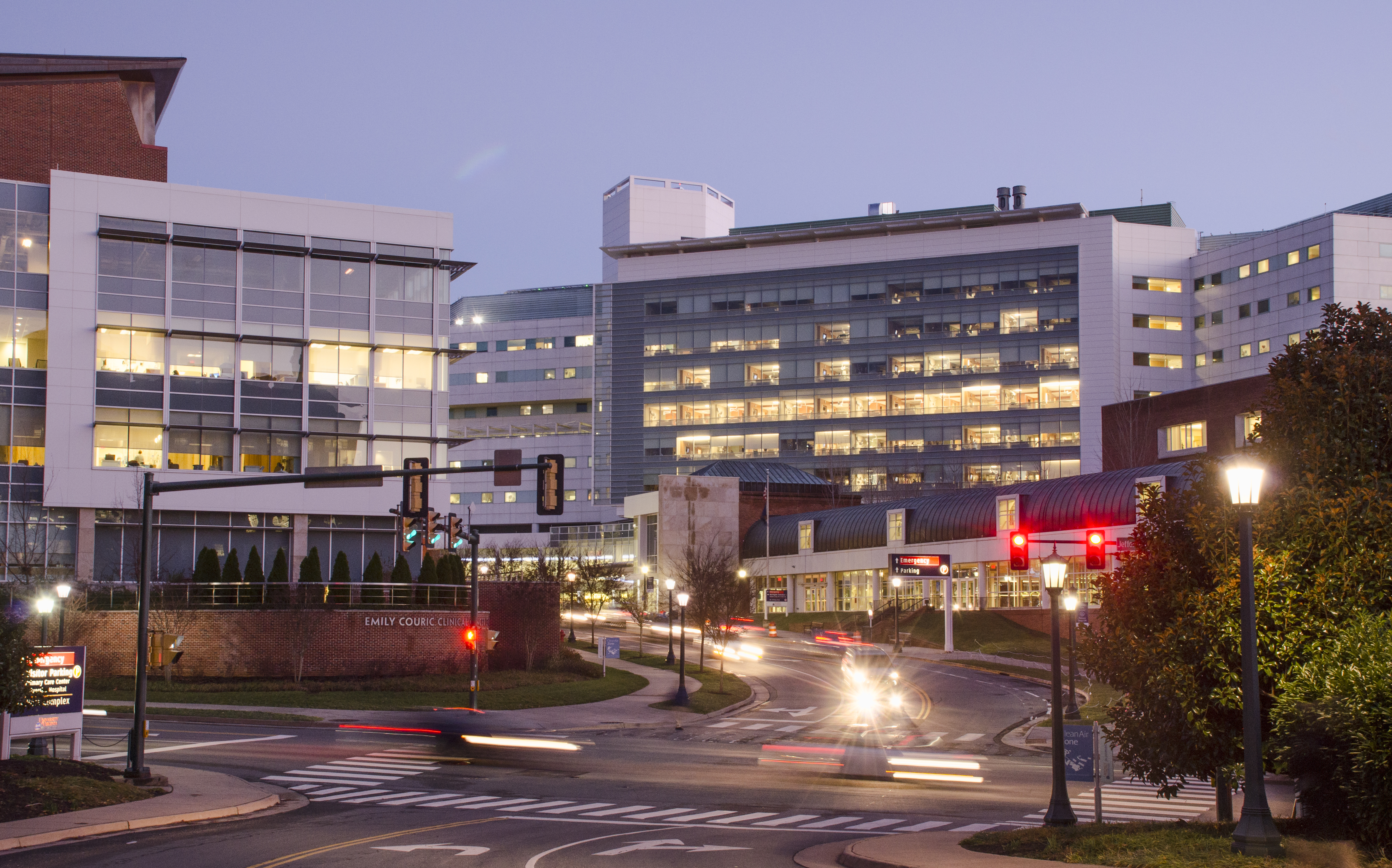 UVA hospital at dusk with lights on