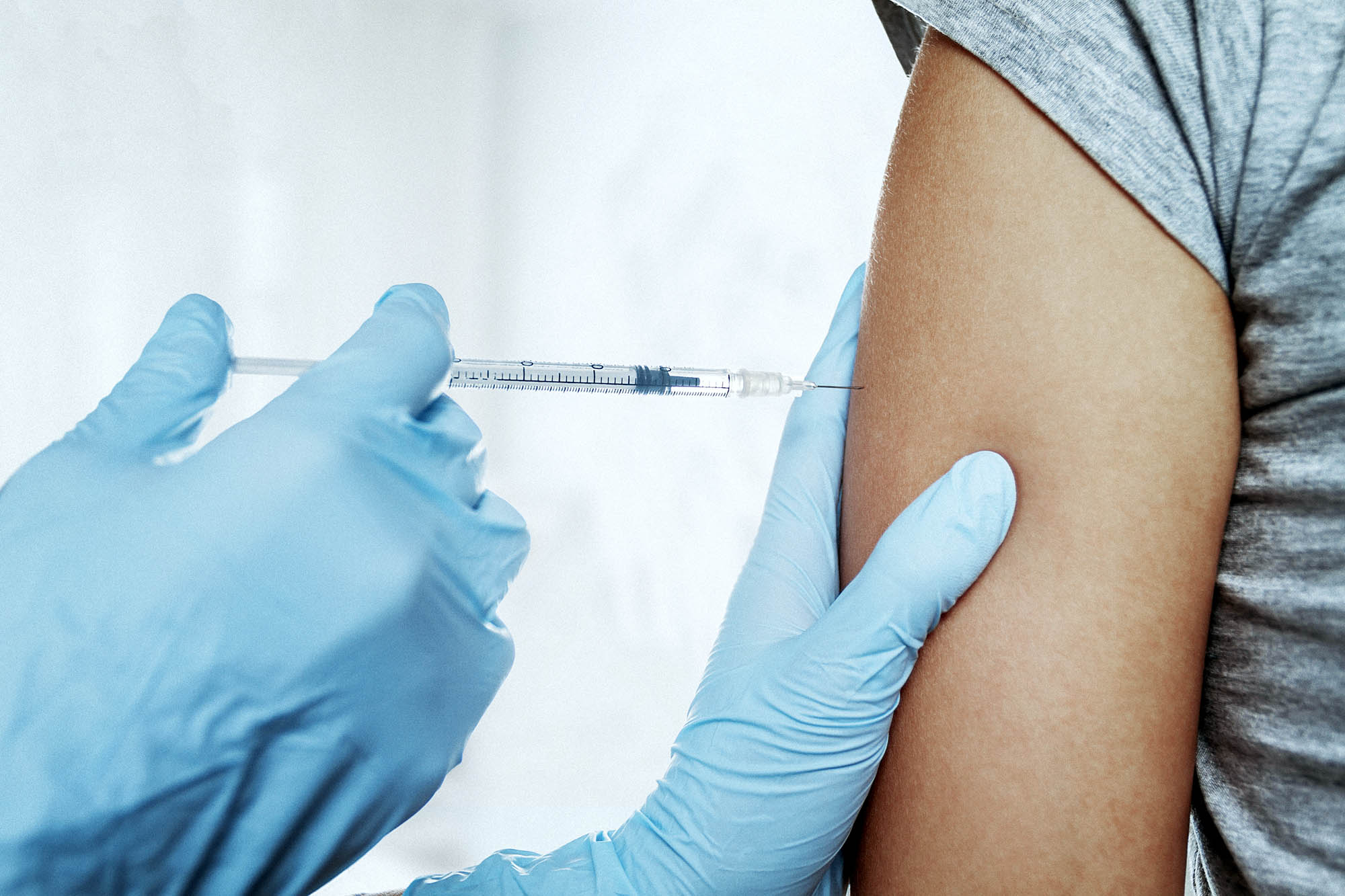 Patient receiving and injection in the arm