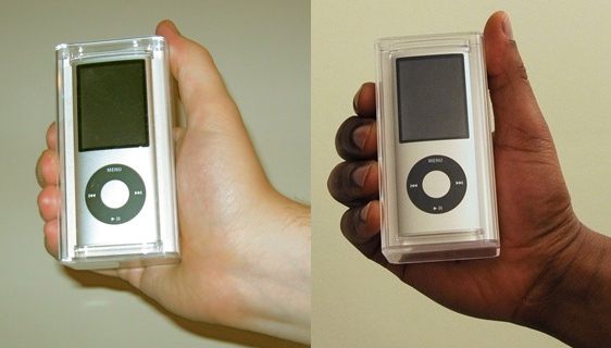 White person holding an iPod. African American holding an iPod