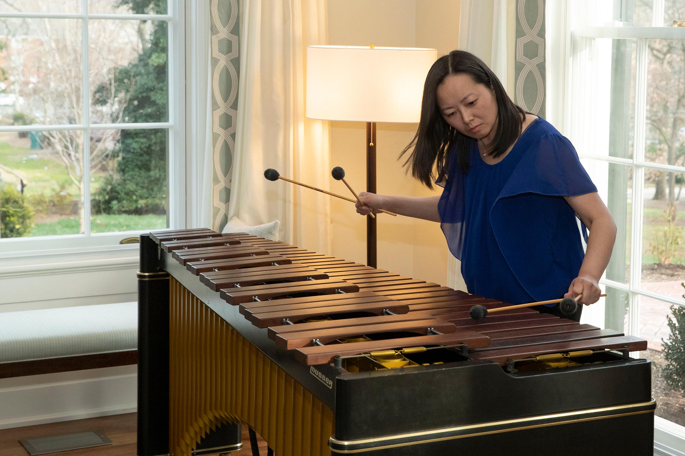 I-Jen Fang playing the marimba with two mallets in each hand