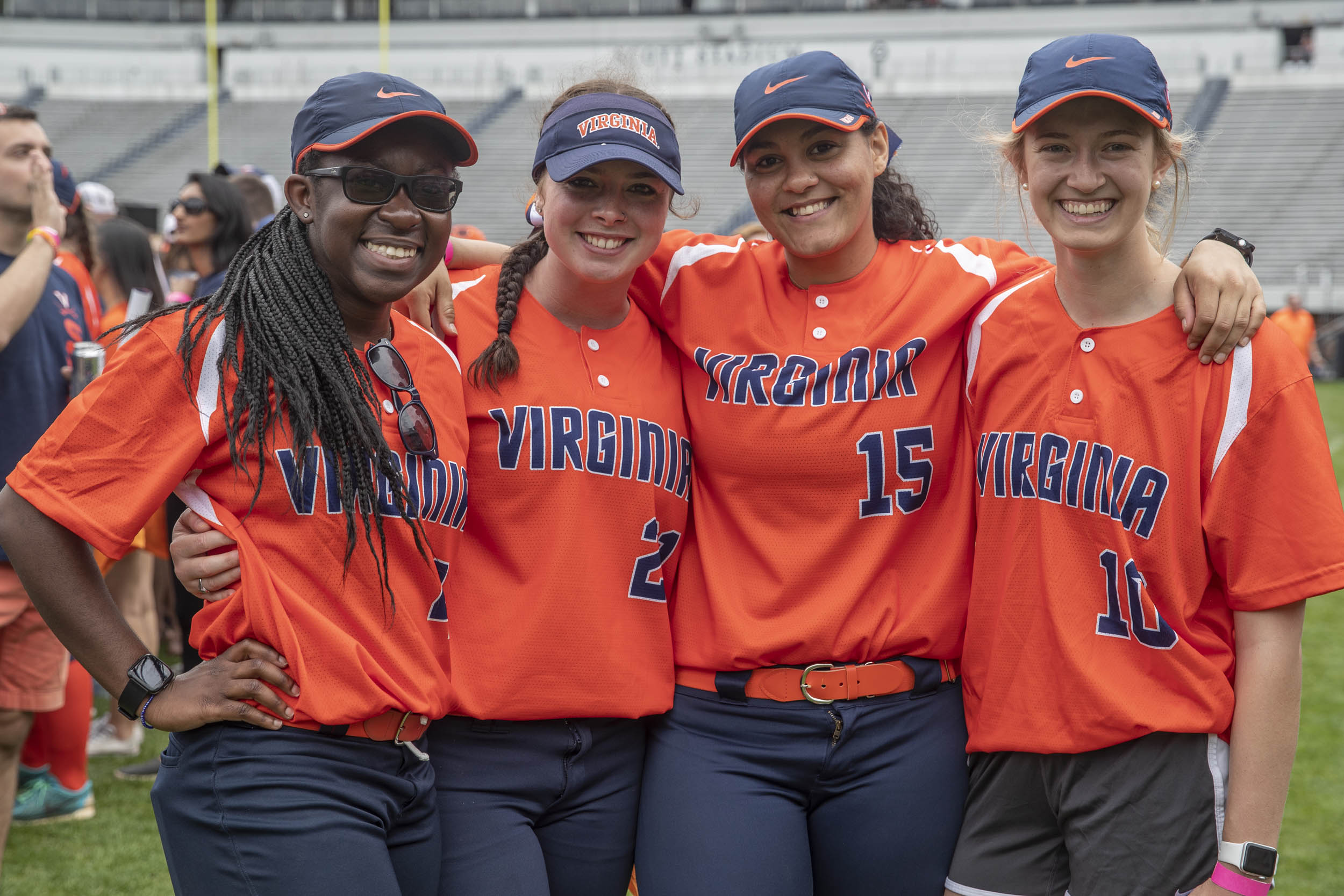 UVA softball players stand together for a picture