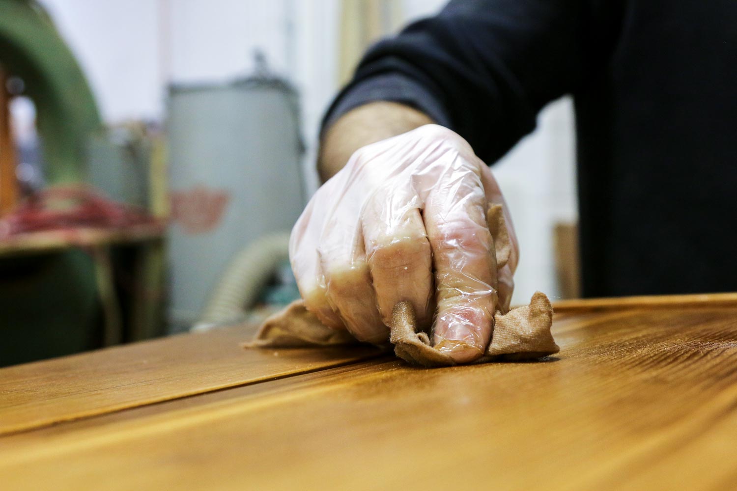 Person staining a bird box