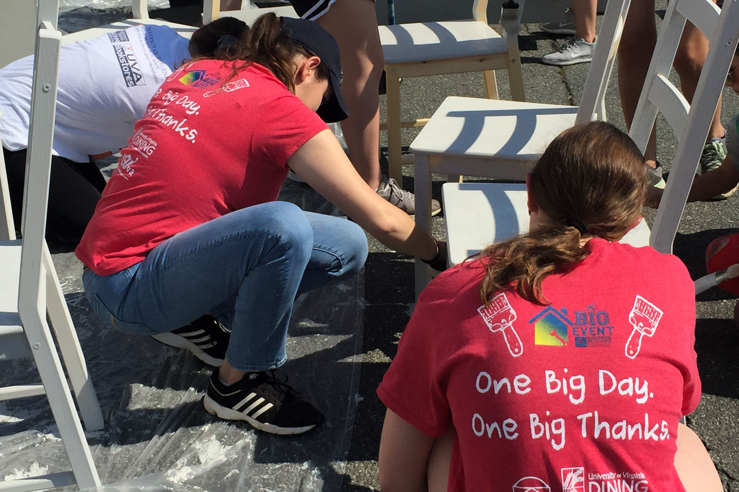 Students from Catholic Hoos paint furniture at the Belmont Arts Collaborative.