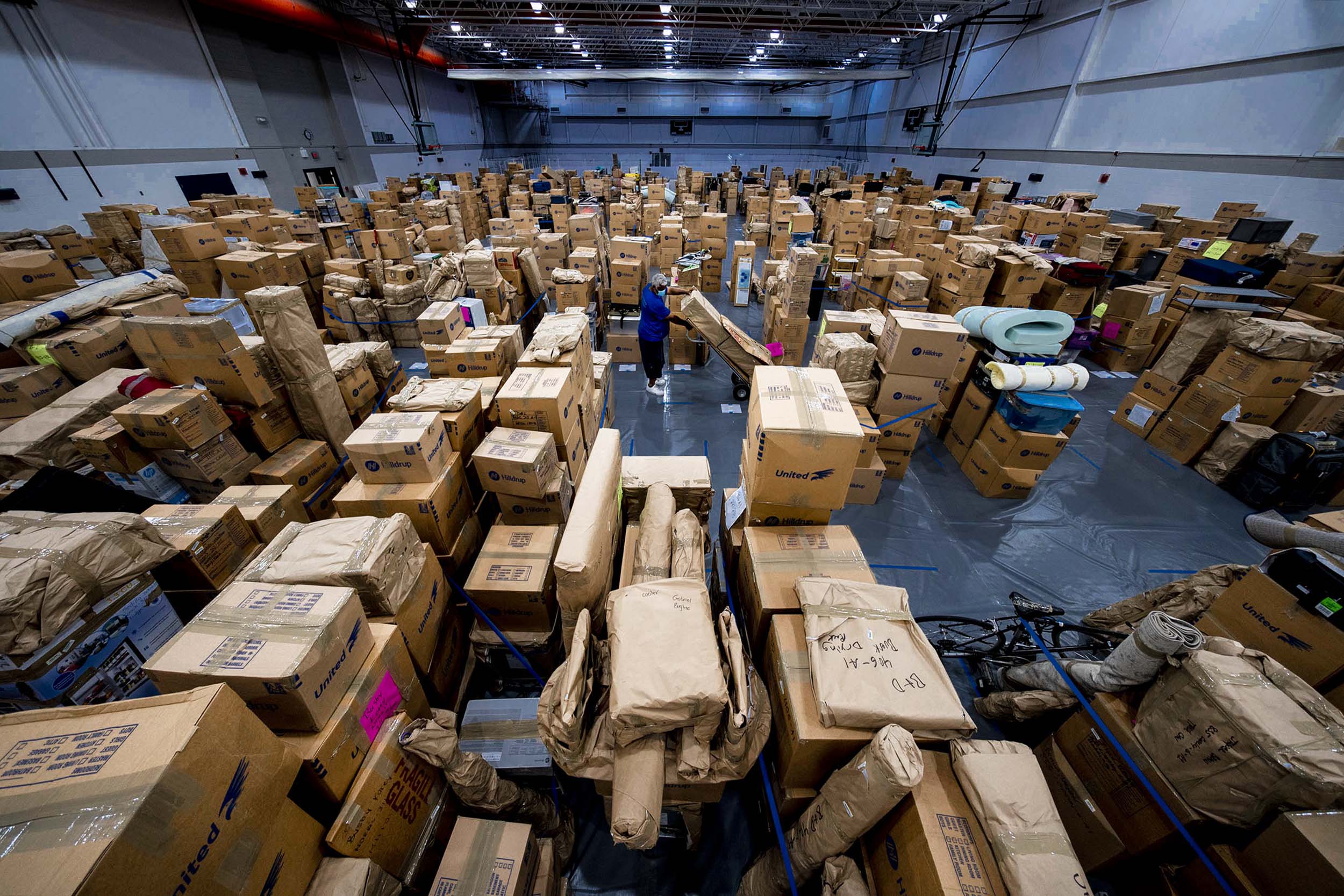 UVA mailroom filled with stacks of boxes