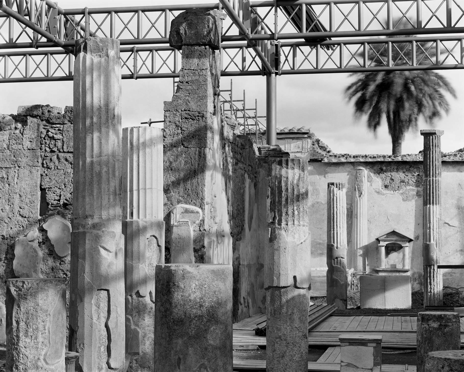 Broken pillars in Pompeii, black and white image