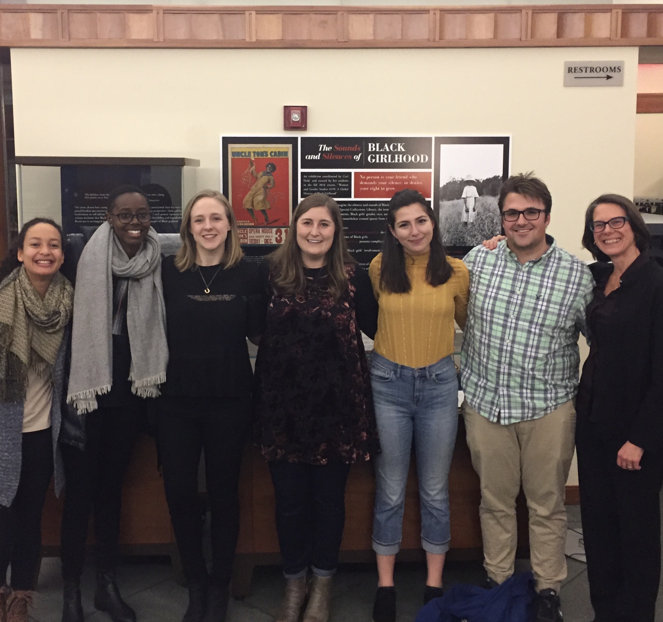 Assistant professor Corinne Field, right, with some of the students in her Global Black Girlhood class who created an exhibit at the Small Special Collections Library. 