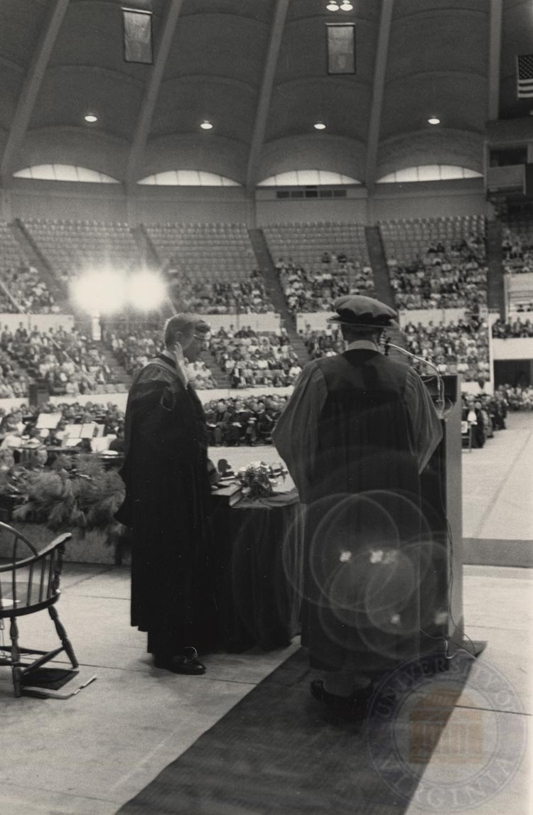 Bob oneil stands at the podium being inaugurated