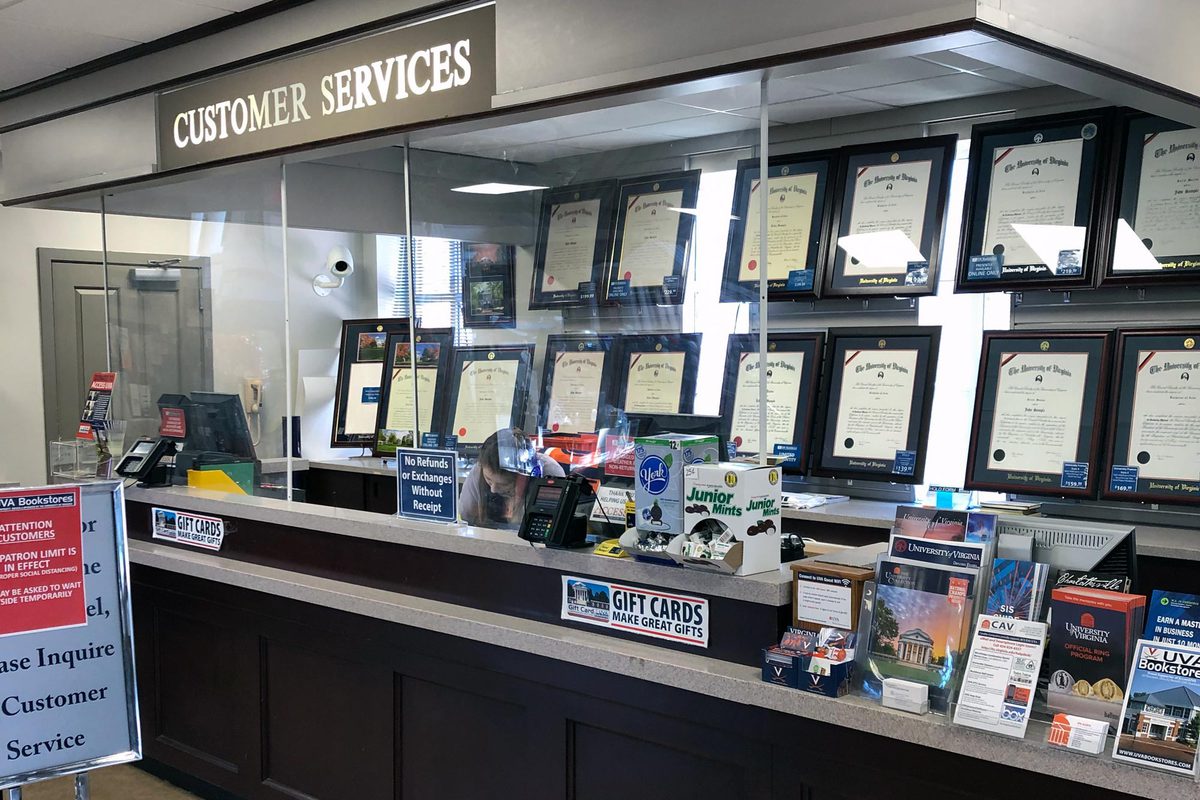 Plexiglass protective shields at the University Bookstore Customer Service desk