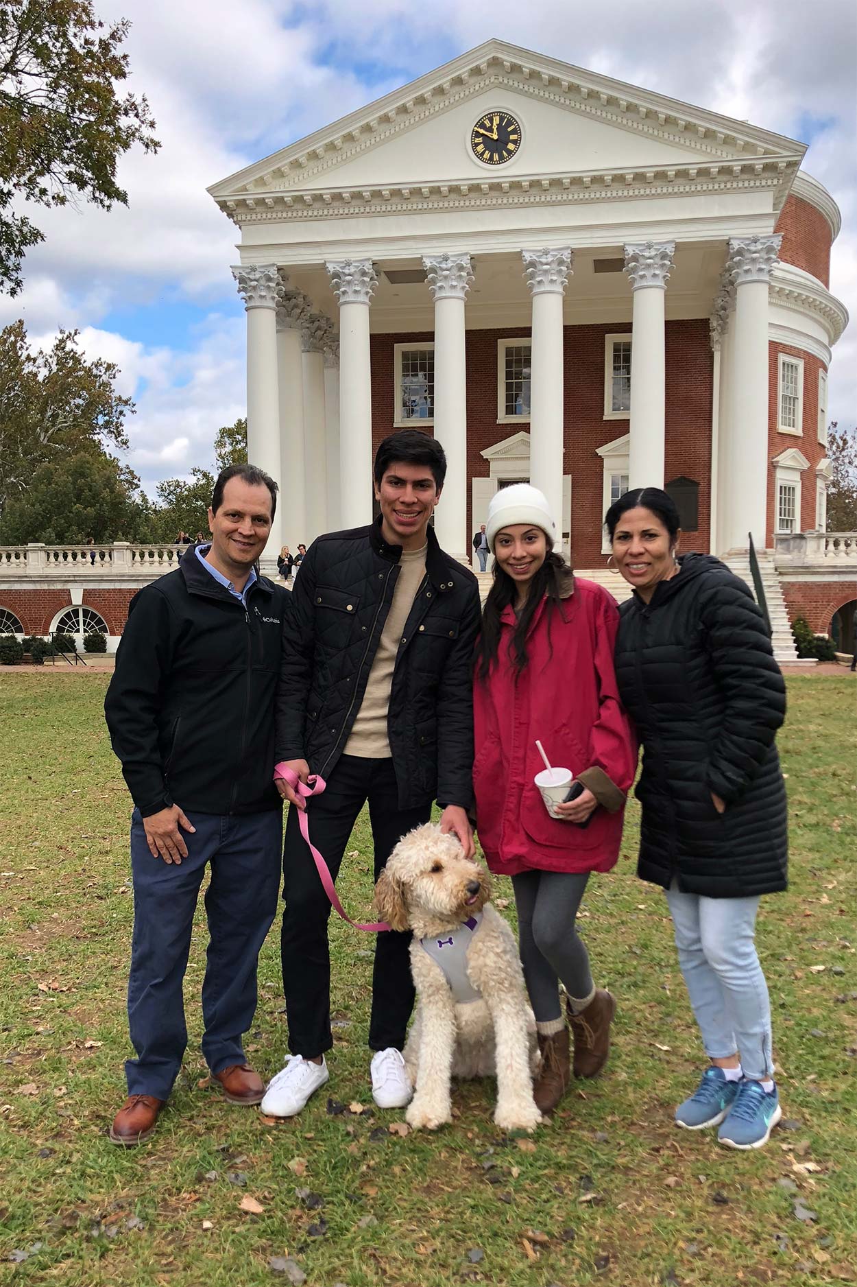 Zuluaga, second from left, with his parents, sister and dog, Belle