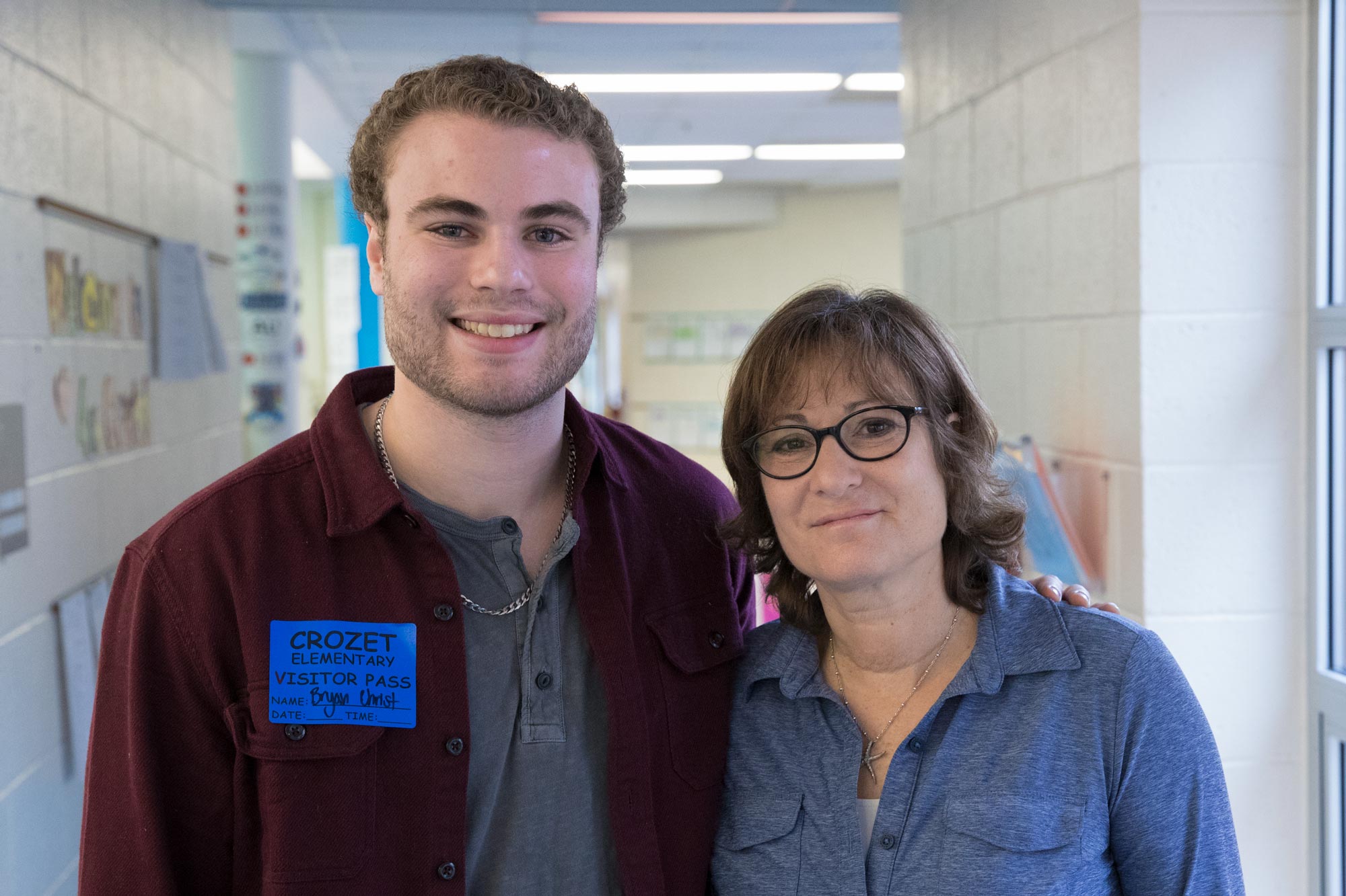 Bryan Christ and his mom Gina Christ pose together for a picture