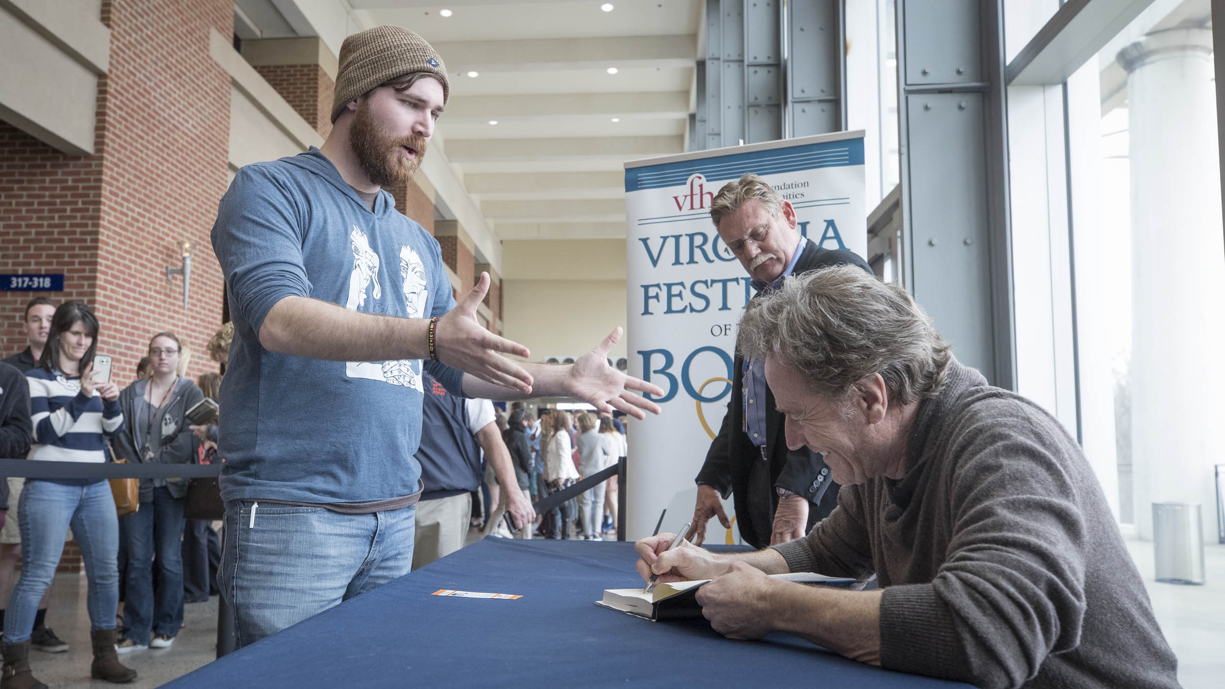 After his talk, Cranston signed copies of his new memoir, “A Life in Parts.” (Photo by Sanjay Suchak, University Communications)