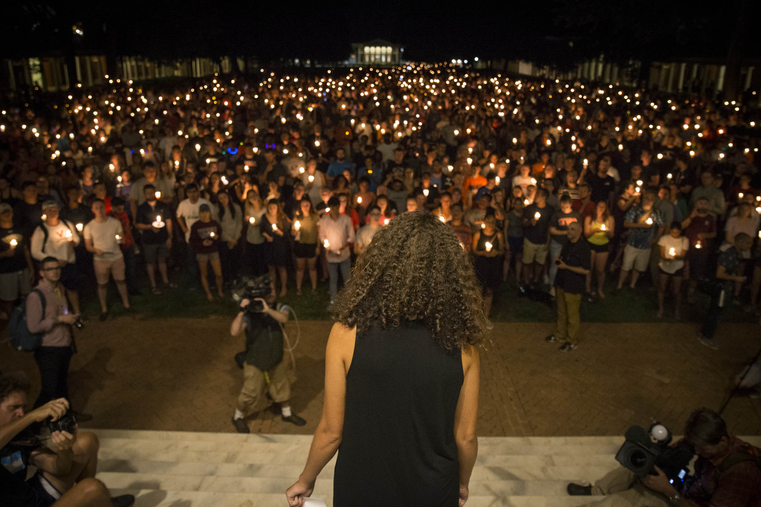 Joy Collins reads a poem during the gathering Wednesday (Photos by Sanjay Suchak, University Communications) Thousands at vigil