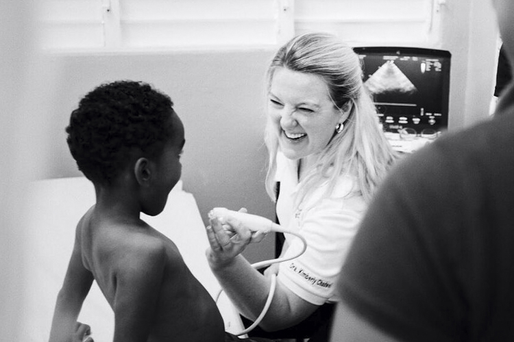 Medical professional uses an ultrasound to look at a little boys heart