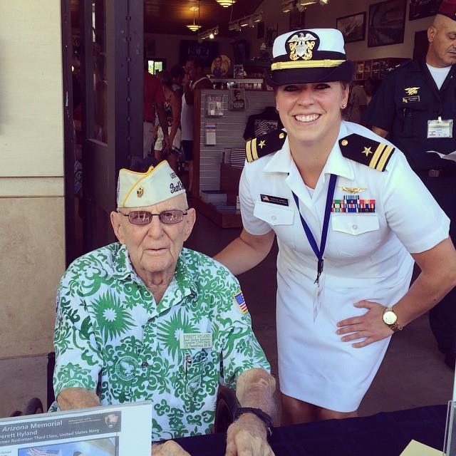 Darney in Navy Uniform stands with a Navy vet