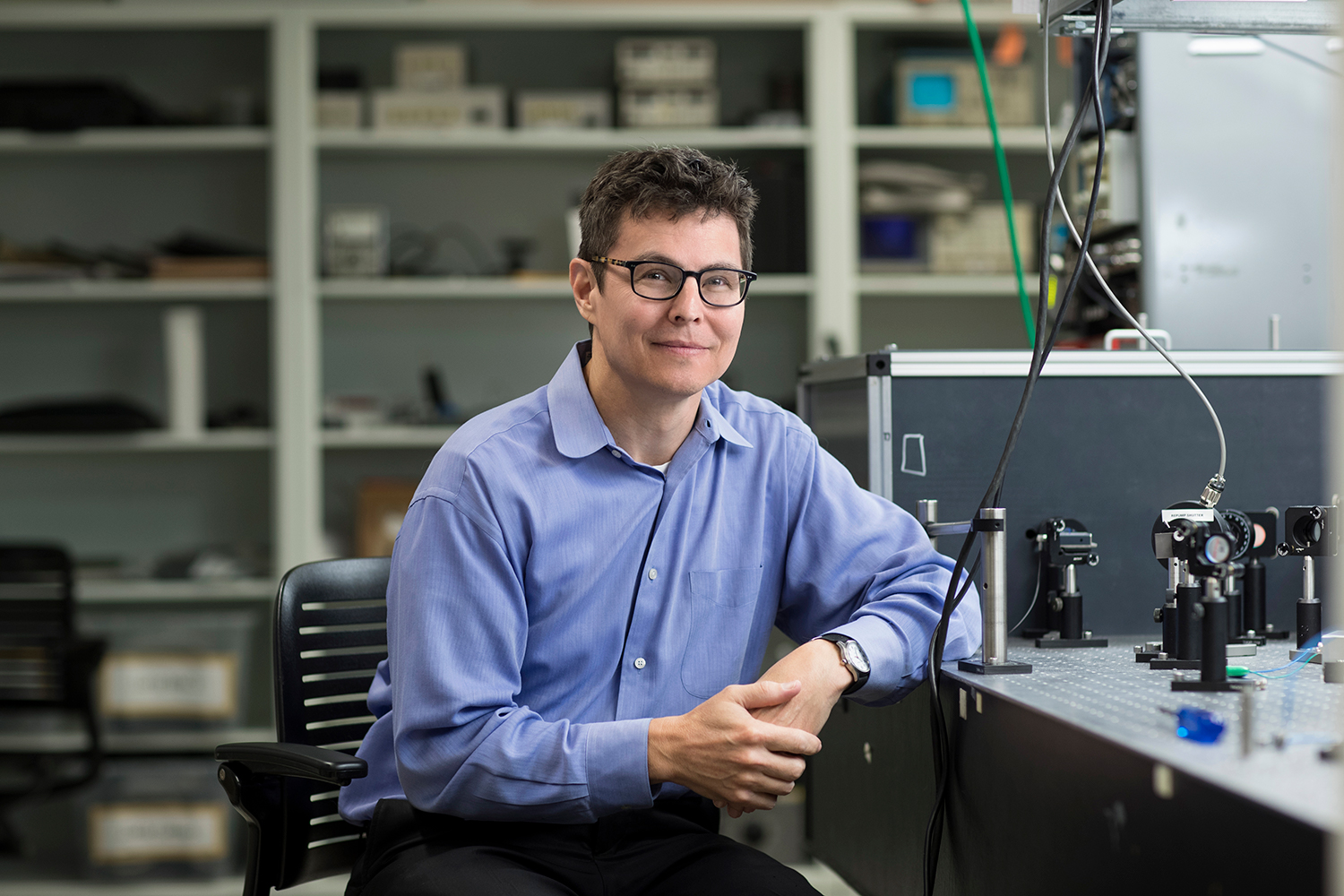 Cass Sackett sitting at a lab table