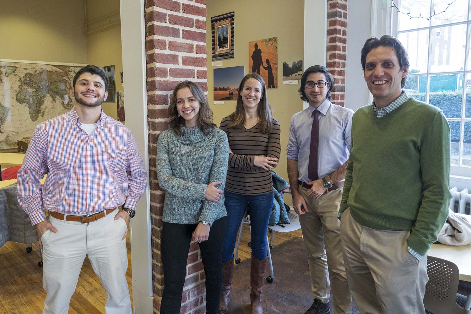 from left to right, Herman Pfaeffle,  Alena Titova, Dr. Megan Gray, Art Kulatti, and Dr. Scott Heysell, stand smiling at the camera