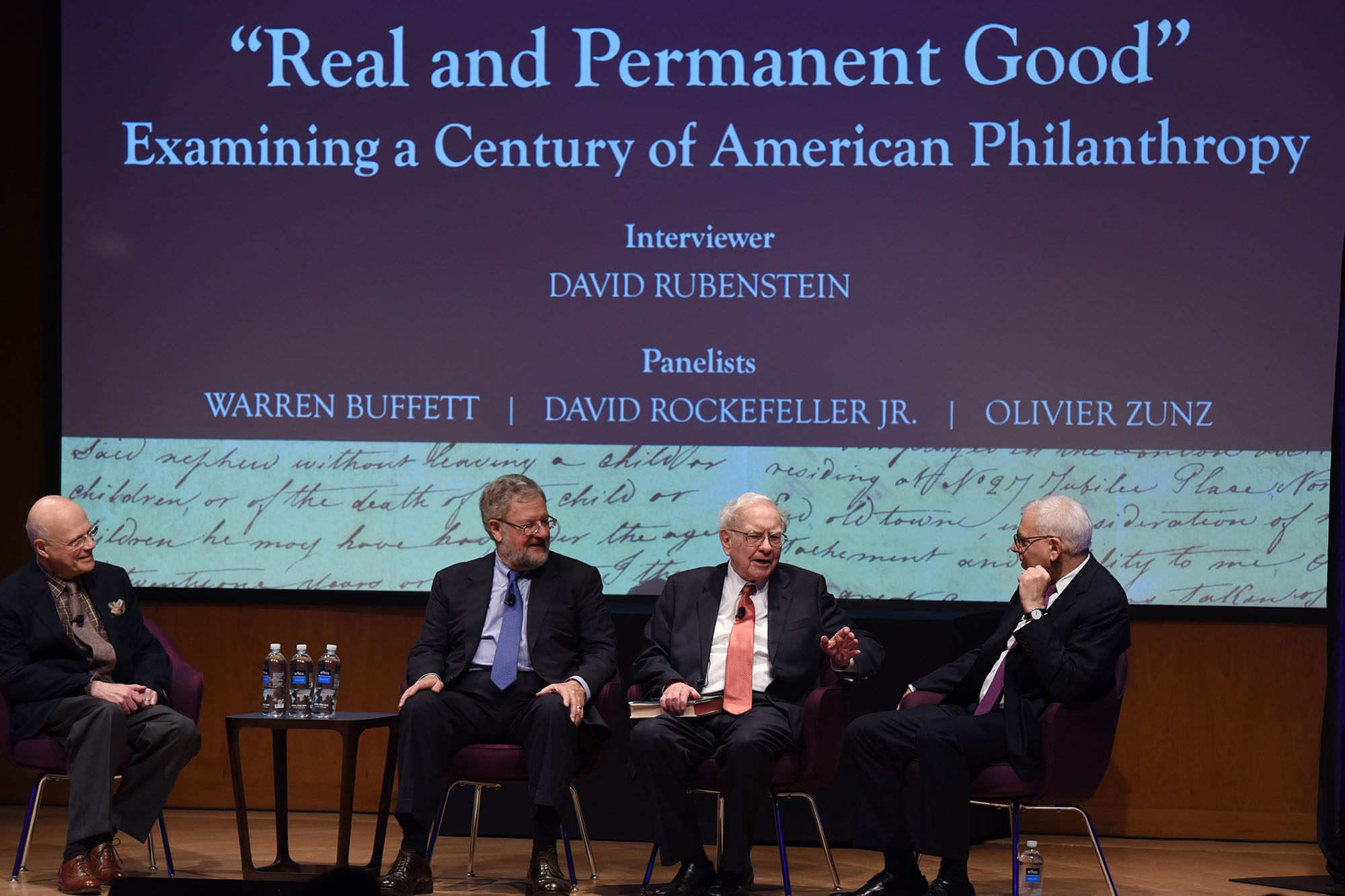 Olivier Zunz (left), a Commonwealth Professor in the Corcoran Department of History at the University of Virginia, philanthropist David Rockefeller Jr. (second from left), Warren Buffet (center), chairman of the investment house Berkshire Hathaway, and ph