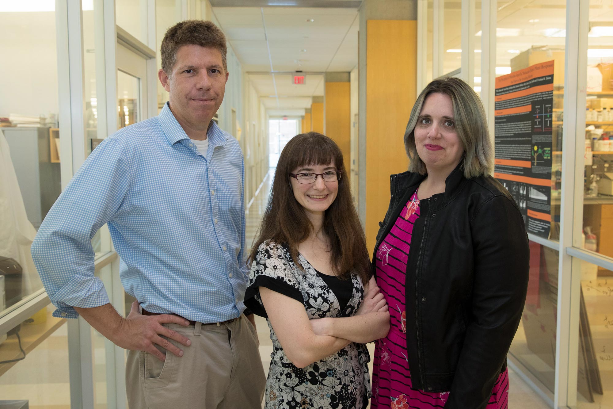 John Luckey, left, Rebecca Pompano, center, Jennifer Munson stand together for a picture