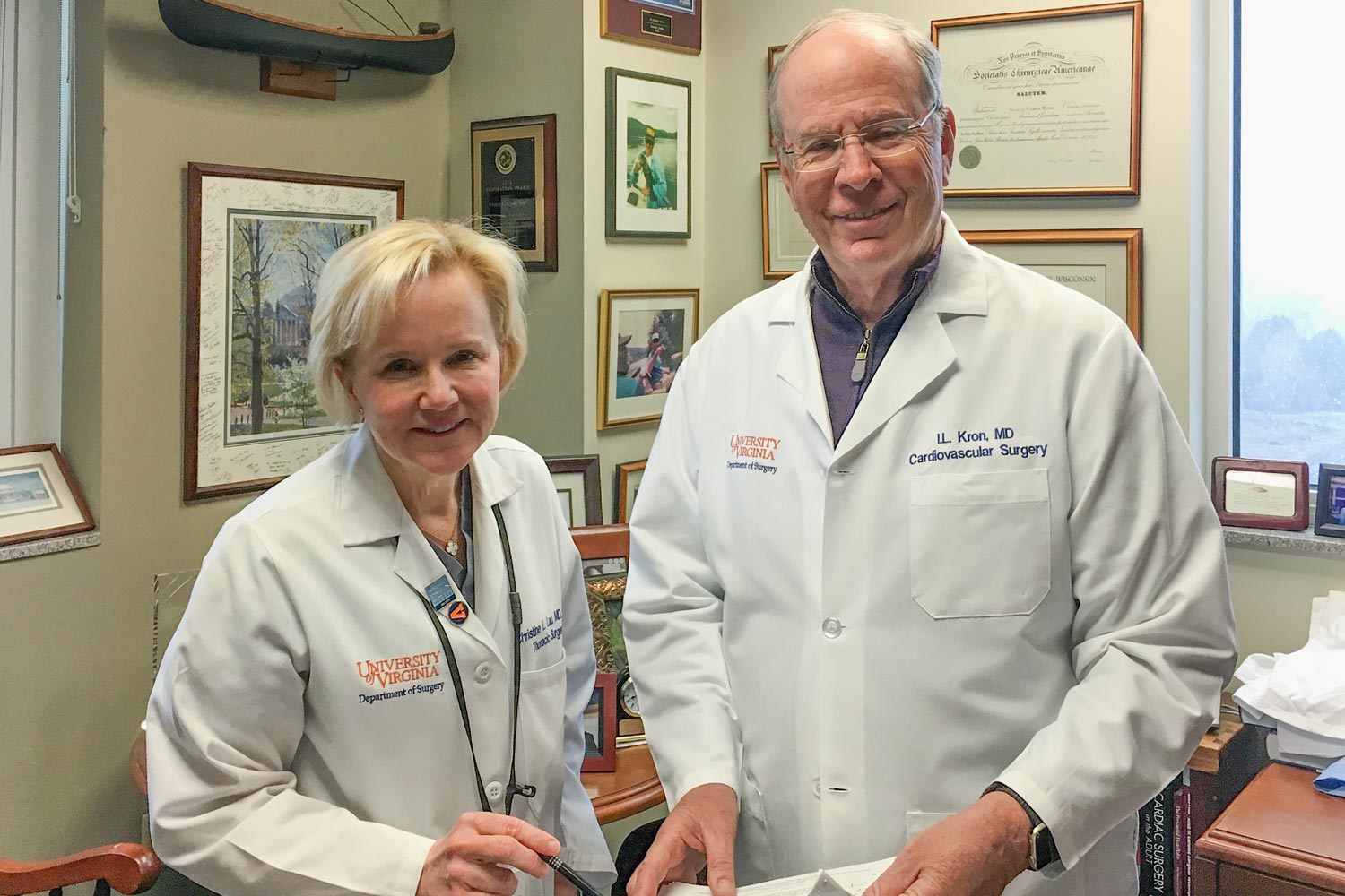 Dr. Christina Lau, left, and Dr. Irving Kron smile for the camera