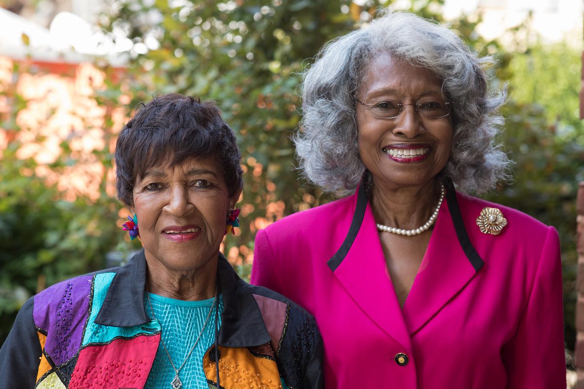 Clariece Coles Harris, left, and Evelyn Gardner stand together for a picture