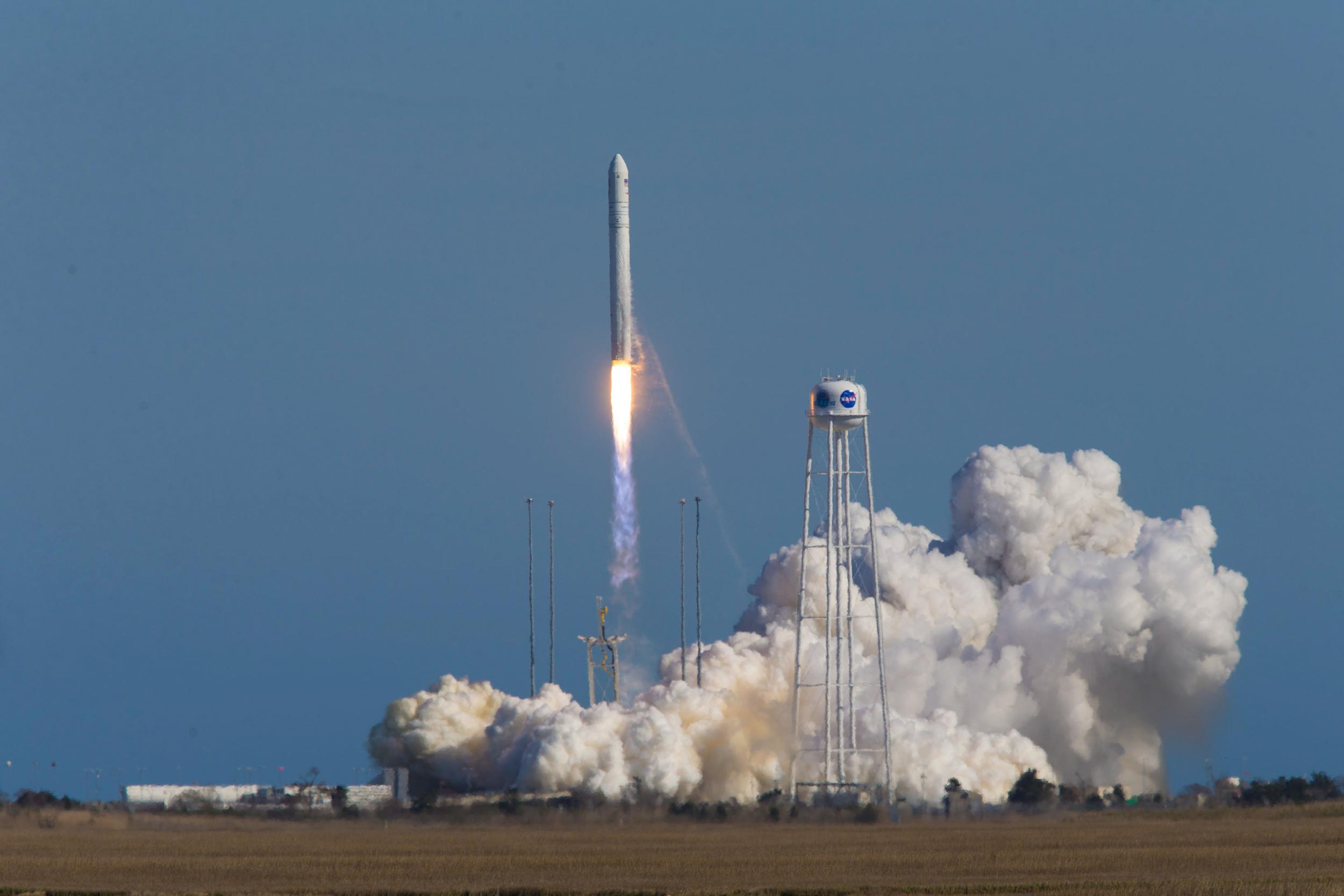 Smoke surrounds the Rocket being launched form Wallops Flight Facility on Virginia’s Eastern Shore