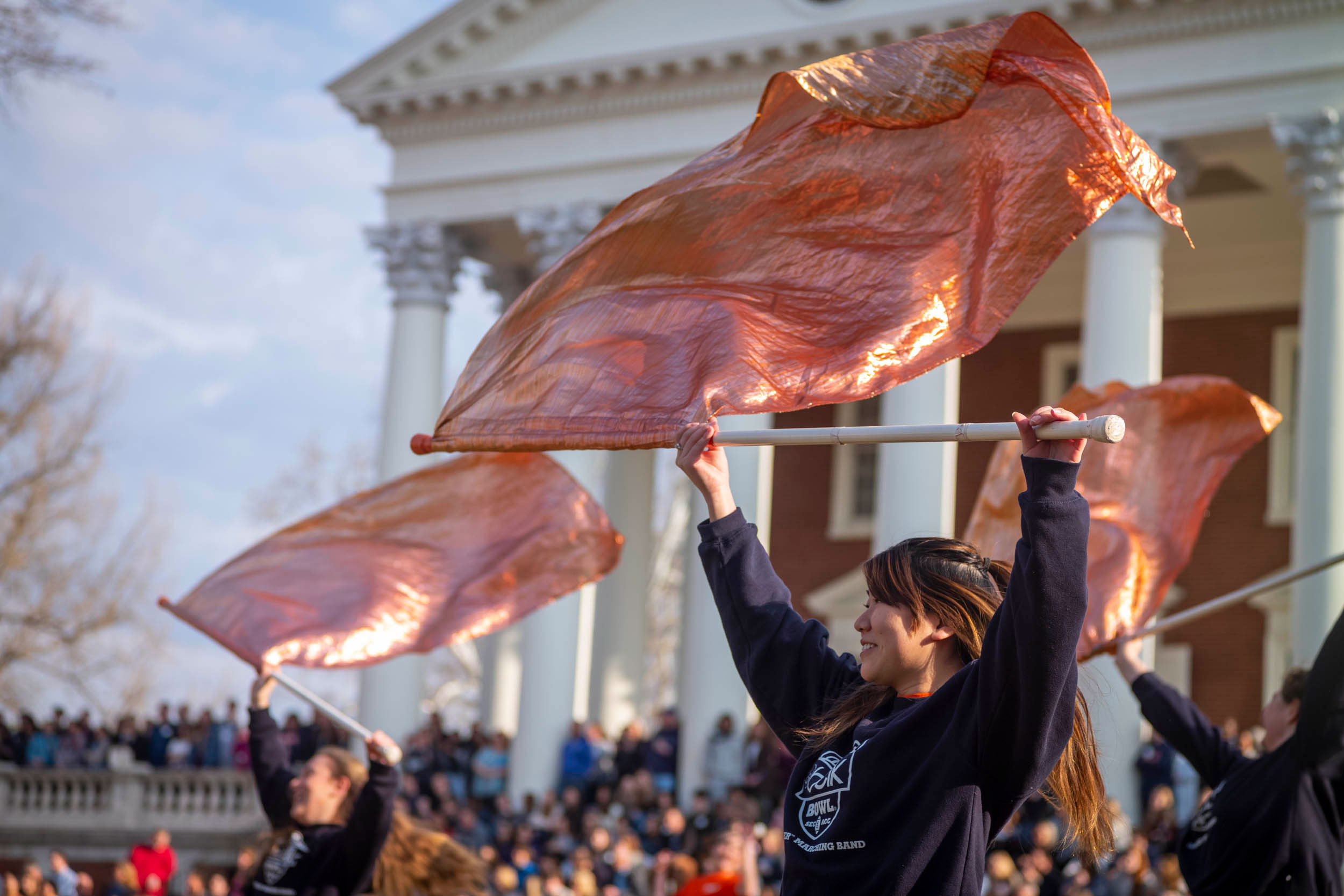 UVA color guard perform on the lawn