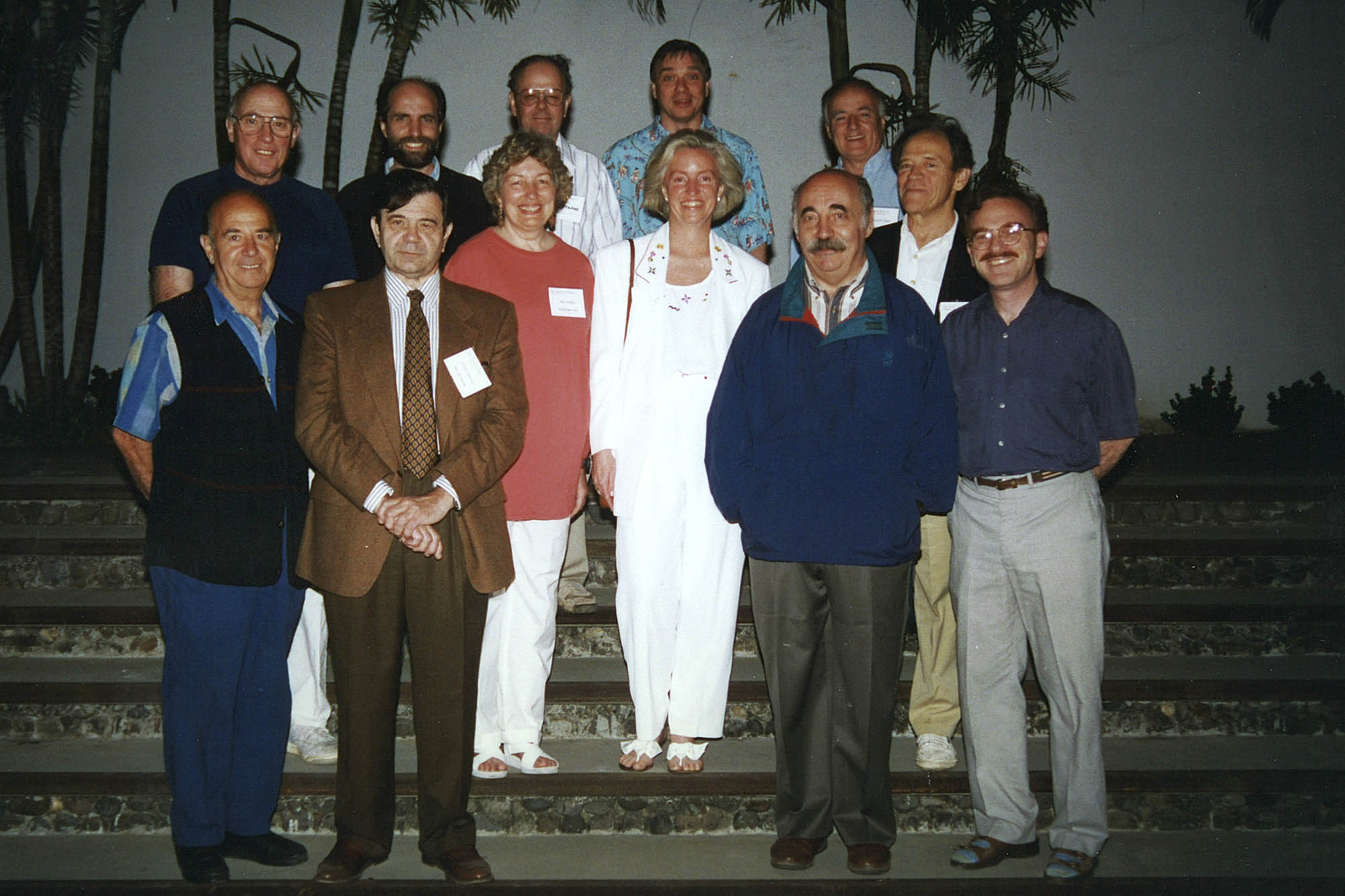 Rebecca Rimel, center, stands with other people for a group photo