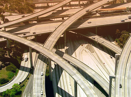 Aerial view of a many layers of roads overtop of each other in a city