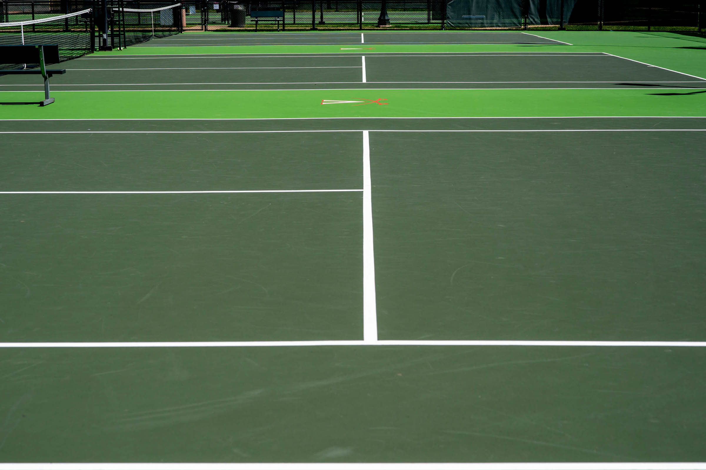 Empty green tennis courts