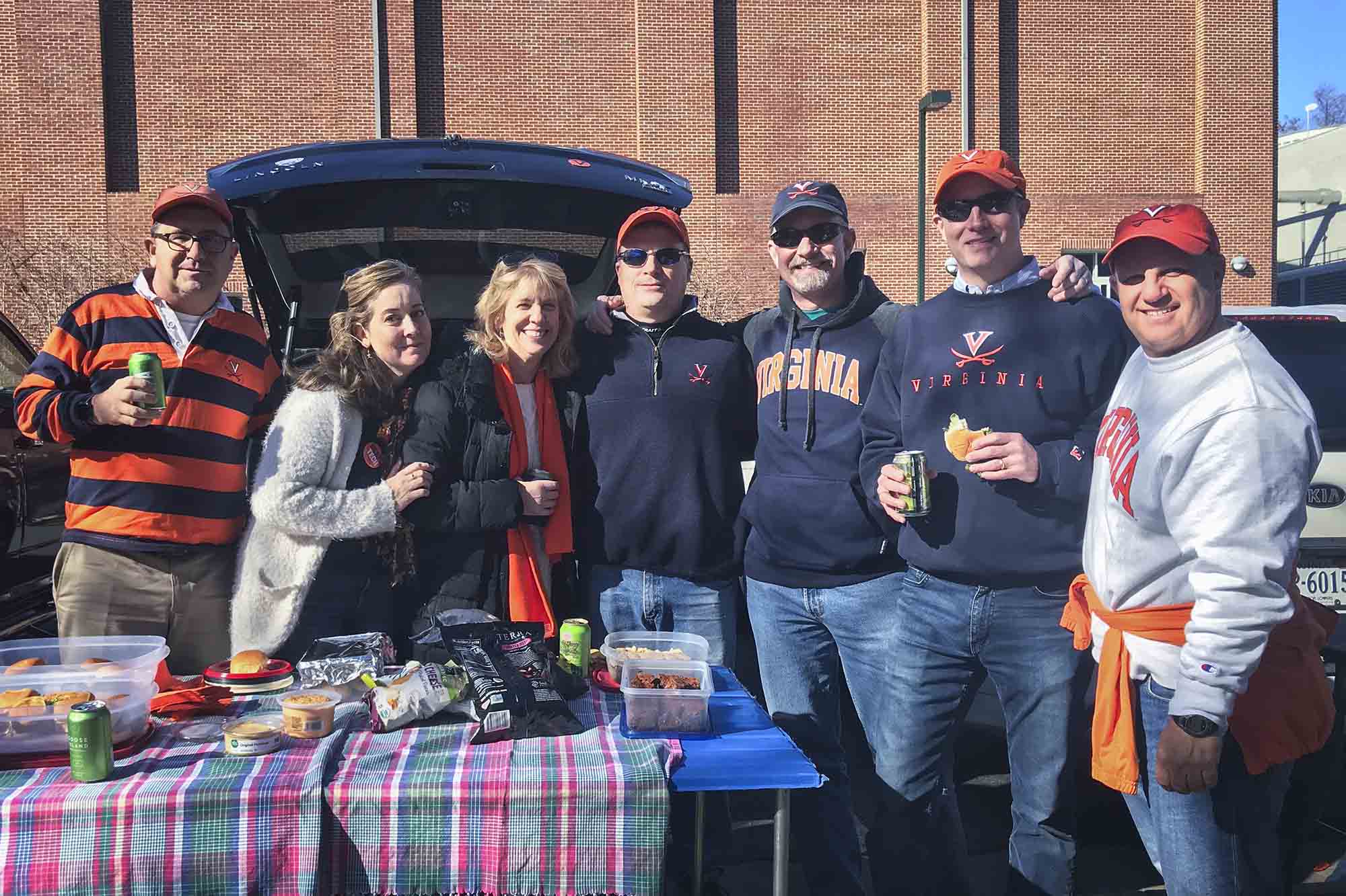 Hager, third from left, tailgates with a group of friends
