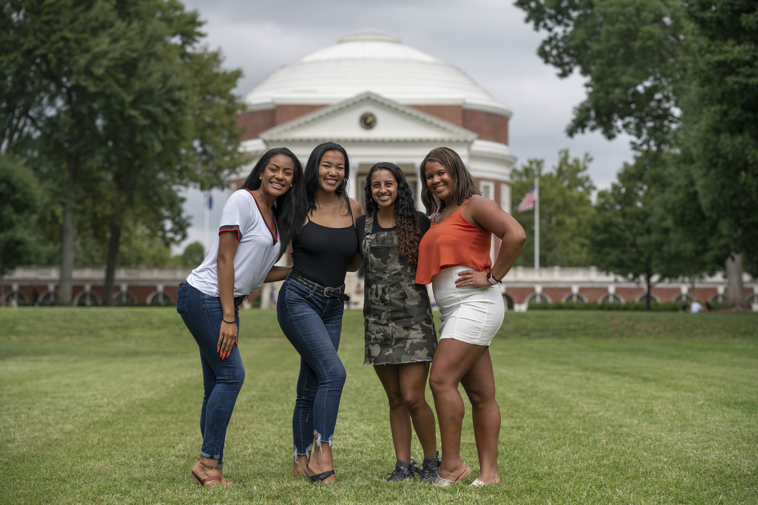 Four woman stand in front of the Rotunda for a picture
