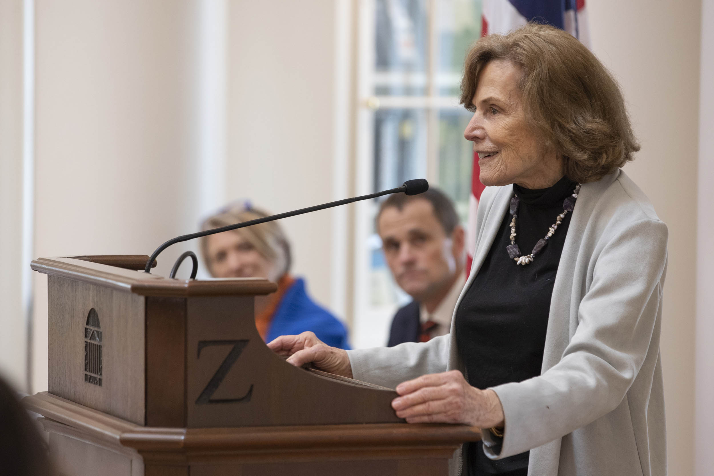 Sylvia Earle speaking at a podium