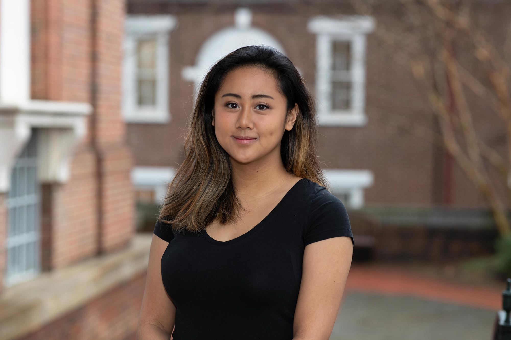 Mananzan stands outside The Fralin Museum of Art, UVA’s own “space for discourse.” (Photo by Dan Addison, University Communications)