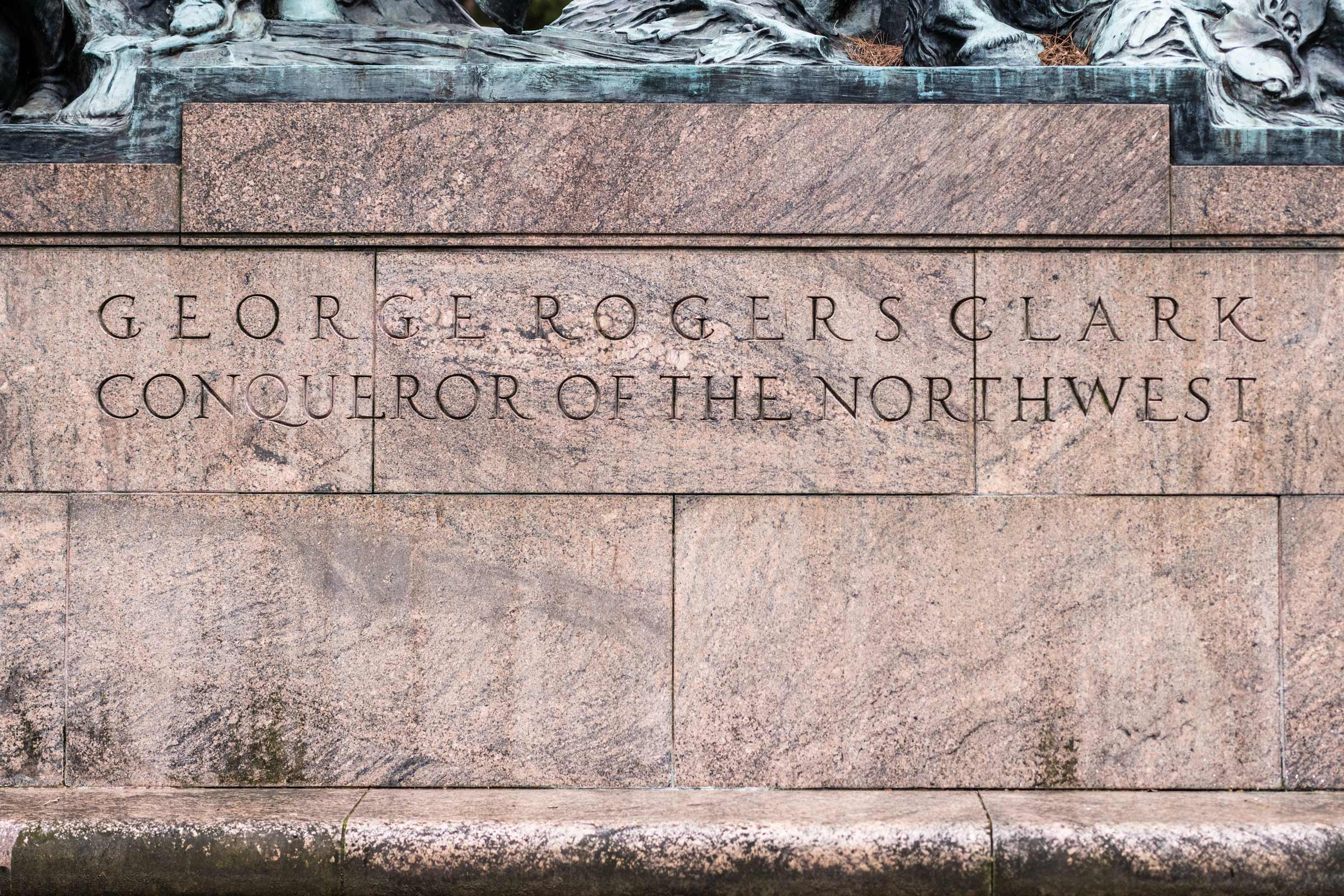Up close of statue text that reads: George Rogers Clarks Conqueror of the Northwest