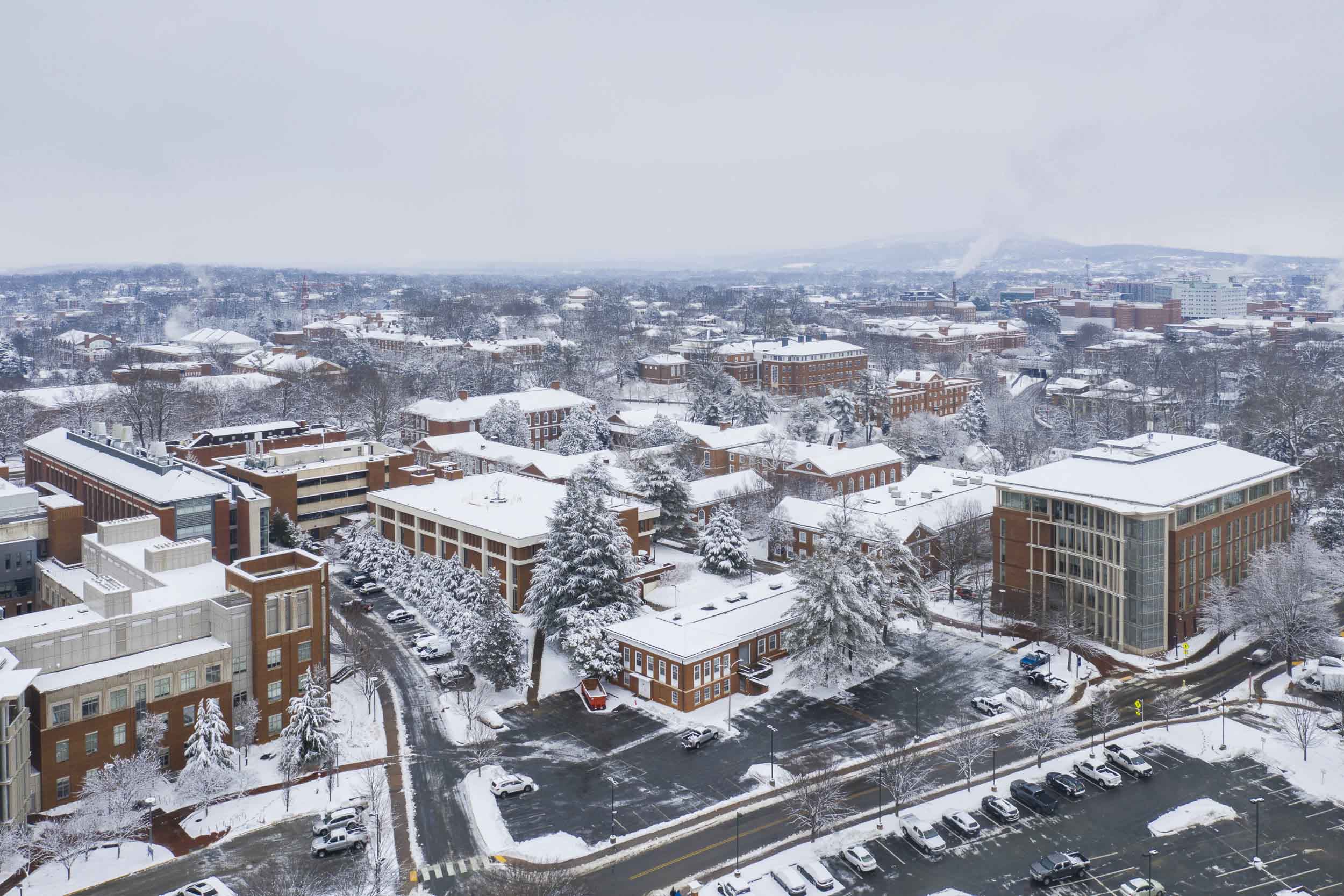 Arial view of snow covered UVA